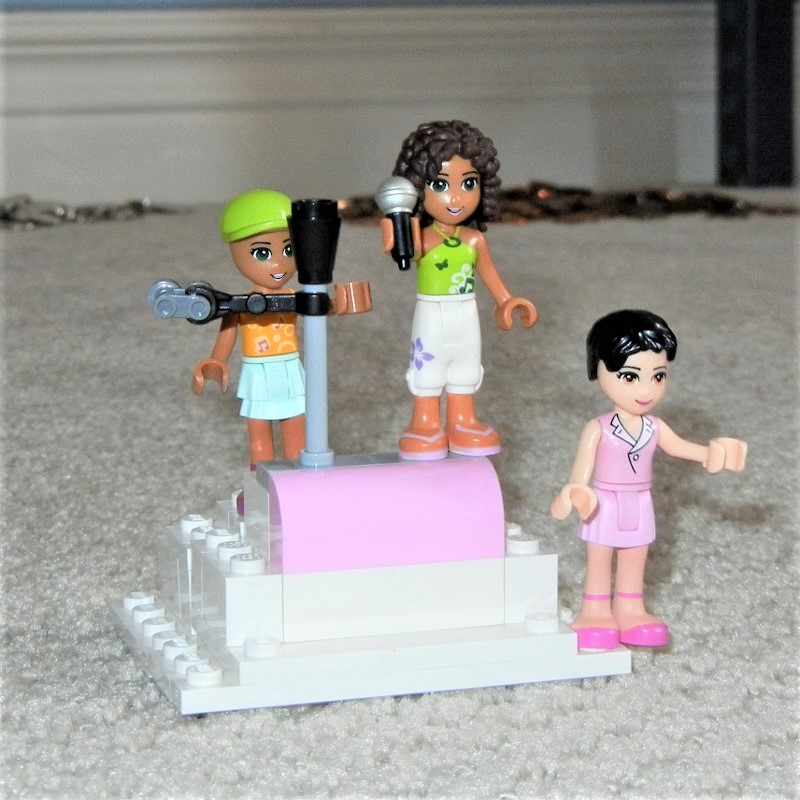 Image of Lego Friends characters with changed hair and hats. 